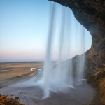 Behind the waterfall